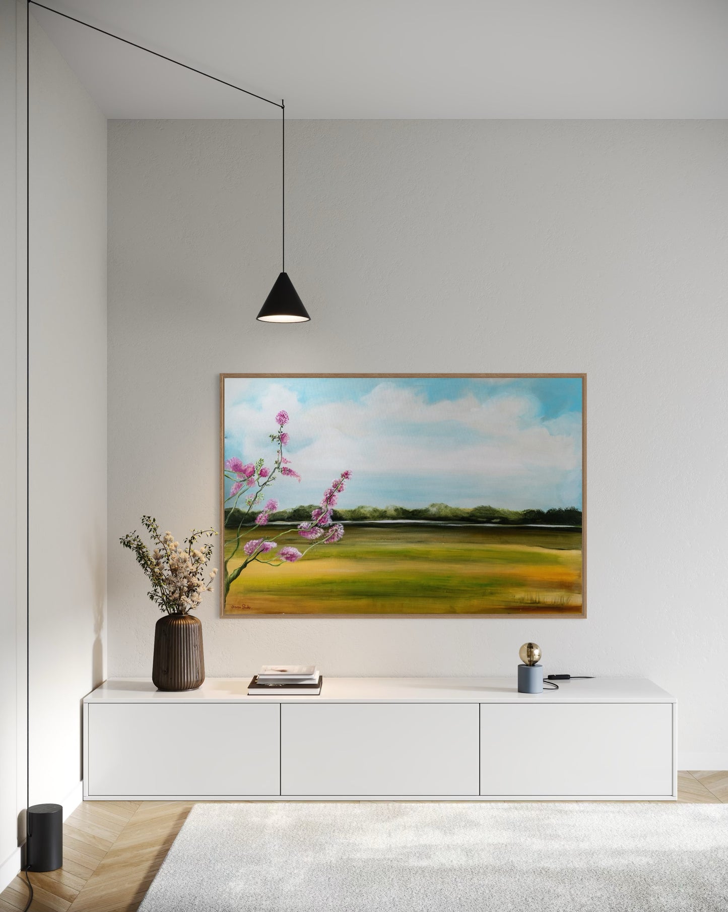 Field with a pink tree